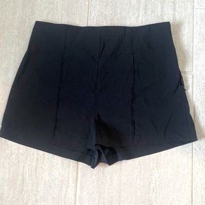 ASOS size 8 black polyester and spandex shorts w side zipper. No pockets